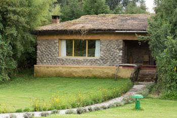 Mountain Gorilla View Lodge room exterior. Gorilla Photo Safaris Rwanda